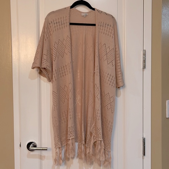 Knitted poncho-like sweater - Picture 2 of 3